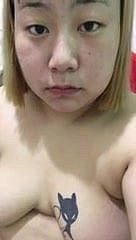 tatoo china blond selfiee